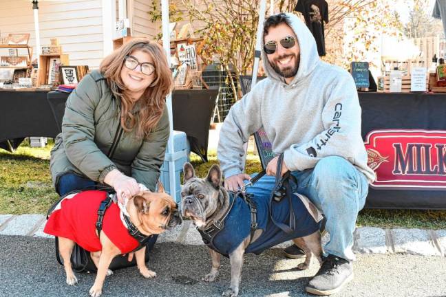 Alexandra and Mark Meyer of Budd Lake with their French bulldogs, Parker and Edgar.