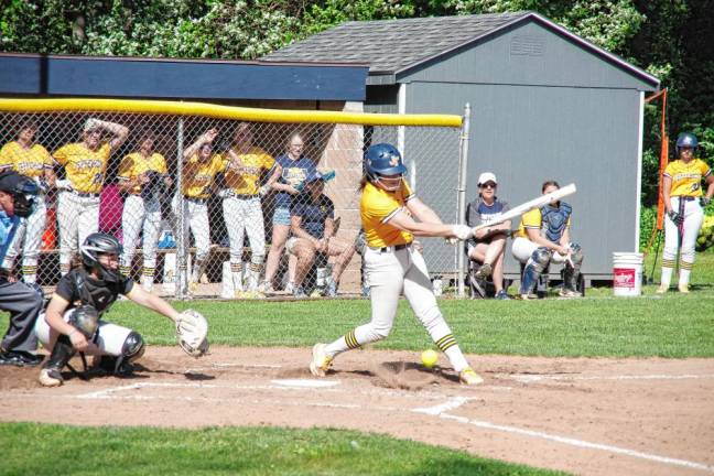 Jefferson batter Kama Skrek hits the ball into foul territory in the first inning. Moments later, she hit a home run.