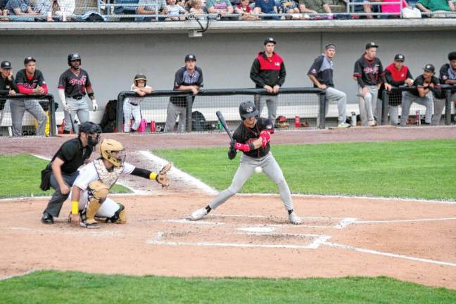 Tri-City ValleyCats batter Jaxon Hallmark watches as the ball crosses home plate. He was credited with one run batted in (RBI).