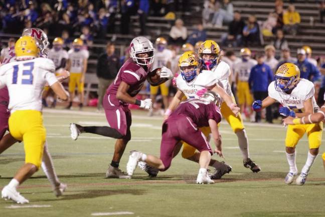 Newton ball carrier DeMarius Posey is on the move in the first half.