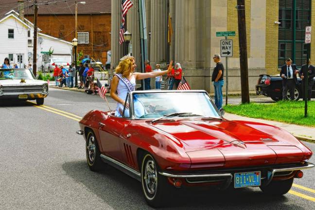 Miss Franklin 2023 Chrystine Mowles rides in a 1966 Corvette driven by Bill Truran, Sussex County’s historian. Mowles also won the Miss Garden State title in March.