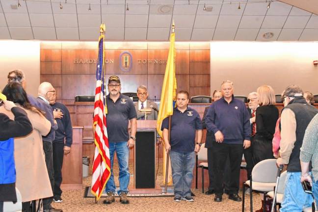 Veterans hold flags in the Hardyston municipal building for the Veterans Day Ceremony on Saturday, Nov. 9.