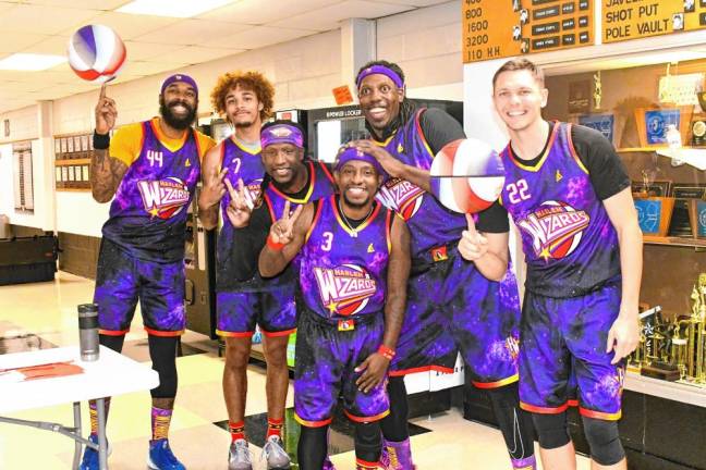 The Harlem Wizards pose before the game.