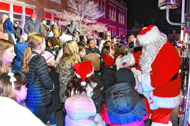 OG1 Santa arrives on a firetruck for the Tree Lighting &amp; Holiday Concert on Dec. 4 at Ogdensburg Elementary School. (Photo by Maria Kovic)