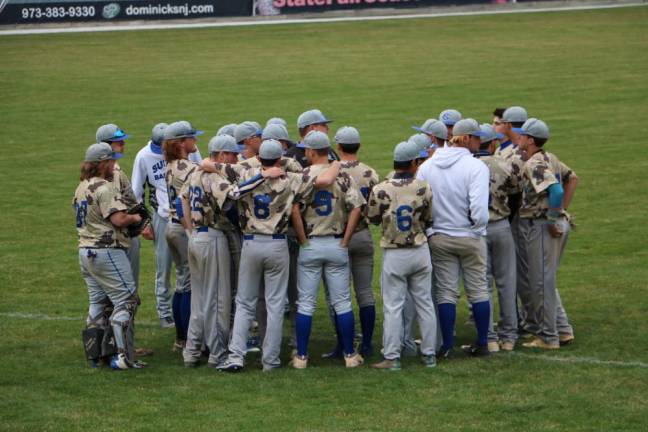 Past members of the Skylanders baseball team line up for the Military Appreciation Game in 2022. (Photo provided)