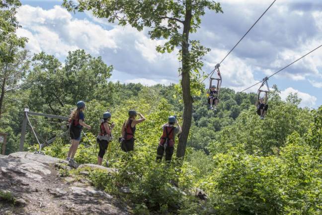 Guests must be between 60 and 270 pounds to zipline and at least 48 inches tall. (Photo by Tommy Lu)