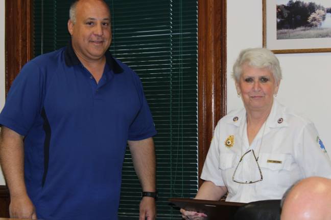 Ogensburg Mayor Steve Ciasullo has proclaimed May as First Aid Month in the borough of Ogdensburg. At the Borough Council's regular meeting on May 12, he presented a plaque to First Aid Squad leader, Pat Sabourin, in recognition of the &quot;dedication to our human needs, health, and welfare&quot; by the Emergency Medical Services team. The Ogdensburg First Aid Squad is currently recruiting new members. CPR training is provided, and flexible hours are offered. Those interested are encouraged to call: 973-827-3800.