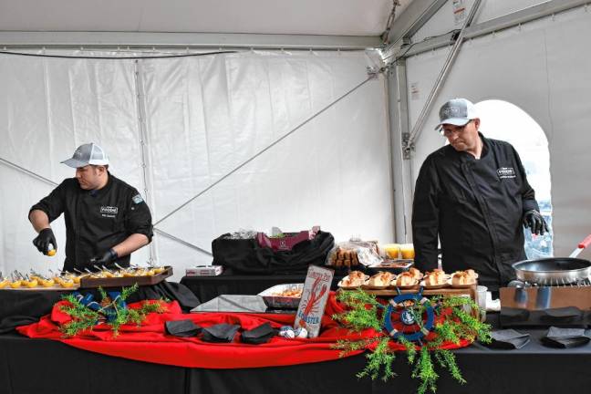 WF3 A team of chefs prepared seasonal fare for the Marketplace Lunch on Saturday, May 4.