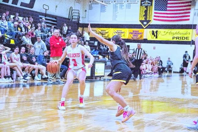 <b>HP2 High Point's Claire Sieminski handles the ball in the third period. She scored 11 points.</b>