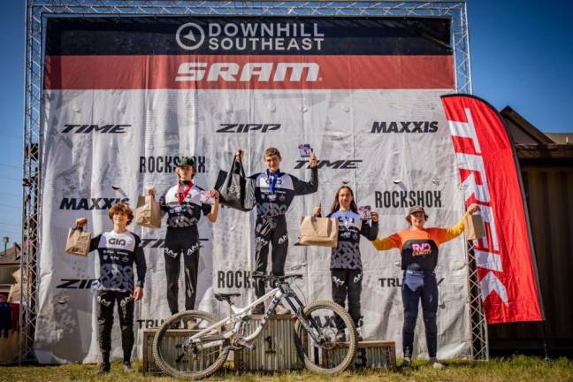 Four of the five winners on the podium were members of Gears in Action: from left, Connor Parmelee, Ethan Finn, Johnathan Yorke and Matthew Keegan. (Photo provided)