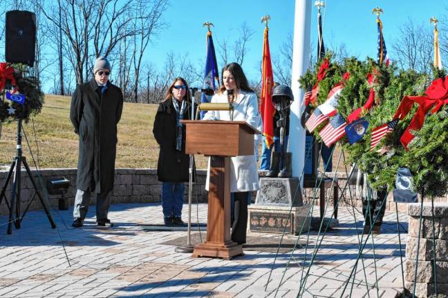 Kristen Doran, a field representative for Rep. Tom Kean Jr., R-7, speaks during the Wreaths Across America ceremony at the Northern New Jersey Veterans Memorial Cemetery in Sparta. At left is Sparta Mayor Neill Clark. (Photo by Maria Kovic)