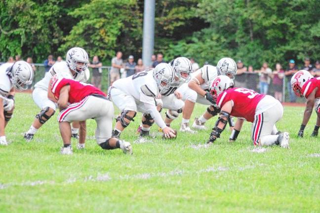 <b>In the first half, the High Point Wildcats and the Wallkill Valley Rangers are set for a play.</b>