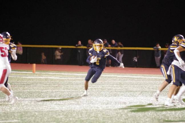 Vernon wide receiver Jayden Quintero moves the ball through an opening in the second quarter.