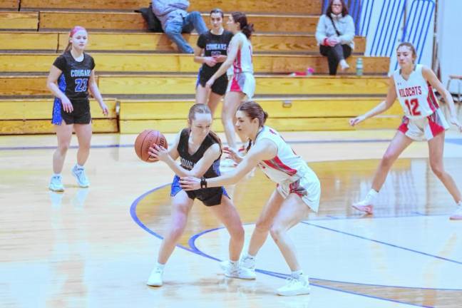 HP3 Kittatinny's Holly Sajdak holds the ball while covered by High Point's Grace Elston. Sajdak grabbed two rebounds and is credited with one assist and one steal.