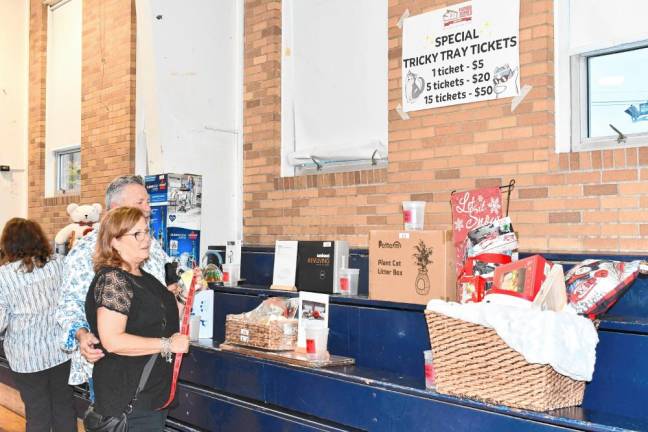 The event includes a dinner and a tricky tray fundraiser.