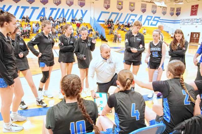 Kittatinny's girls basketball head coach Joshua Reed instructs players during a break.