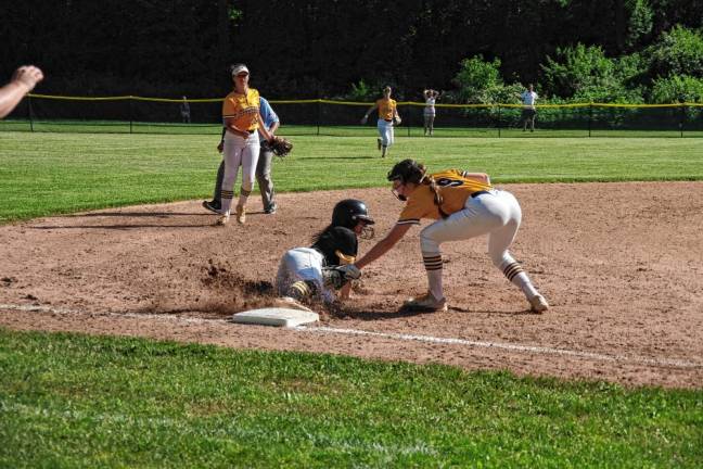 JS1 In the second inning of the NJSIAA North Jersey, Section 1, Group 2 quarterfinal May 28, Jefferson’s Emmagrace Bartels tags out West Milford’s Charlotte Stoll at third base. Jefferson won, 2-0. (Photos by George Leroy Hunter)