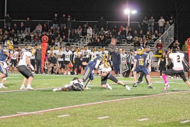 <b>FT2 Vernon wideout Gavin Bruno (22) is hit by West Milford linebacker Cole Czerepak in the first half. Bruno caught one touchdown pass.</b>