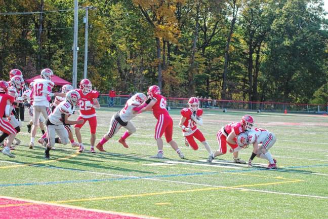 <b>Lenape Valley ball carrier Chase De Oliveira runs toward an opening in the second half.</b>