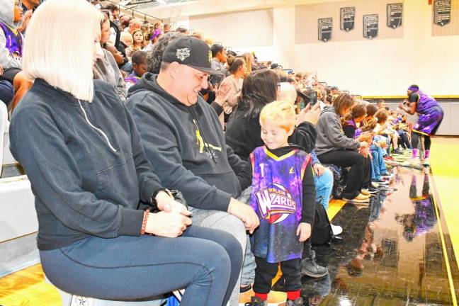 Anthony Lugo of Milford, Pa., wears a Harlem Wizards jersey at the fundraising game Saturday night, Nov. 16 at Wallkill Valley Regional High School in Hamburg.