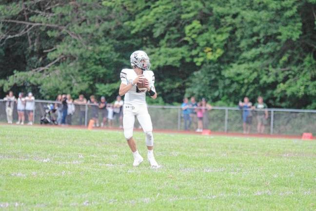 <b>Wallkill Valley quarterback Zack Clarken threw two touchdown passes and scored one rushing touchdown.</b>