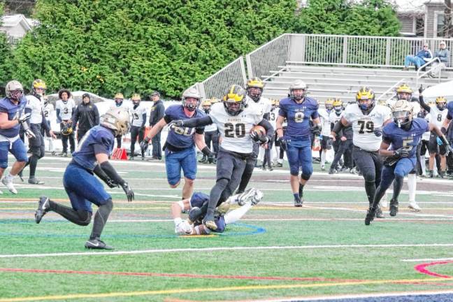 Saint John Vianney ball carrier Abdul Turay on the move in the first half. Turay rushed for 189 yards and made one touchdown.