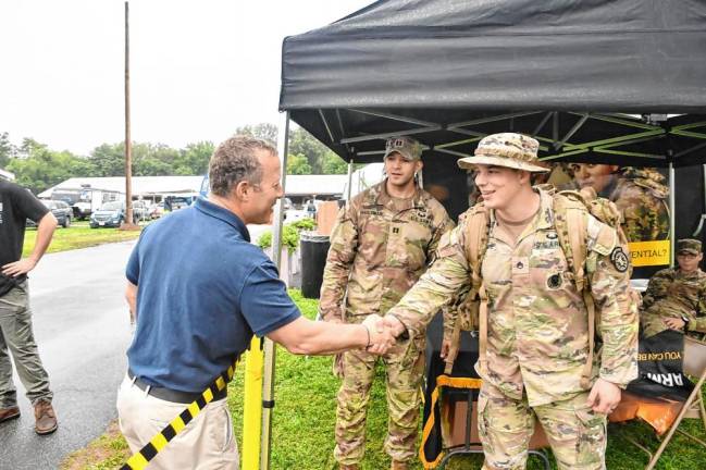 <b>Rep. Josh Gottheimer greets members of local veteran organizations at the fair. (Photo provided)</b>