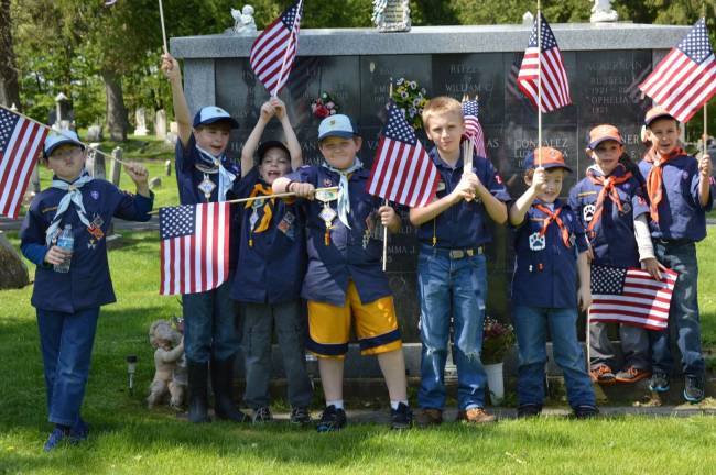 Eight Cub Scouts from Pack 298 assisted The Franklin American Legion by placing 1800 flags on Veterans Graves in the Franklin and Hardyston Cemeteries on May 17 in observance of Memorial Day.
