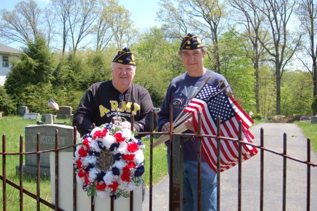 Adjutant Michael Murphy and David Wilton prepare to decorate the graves at the Milton Cemetery in Oak Ridge for Memorial Day.