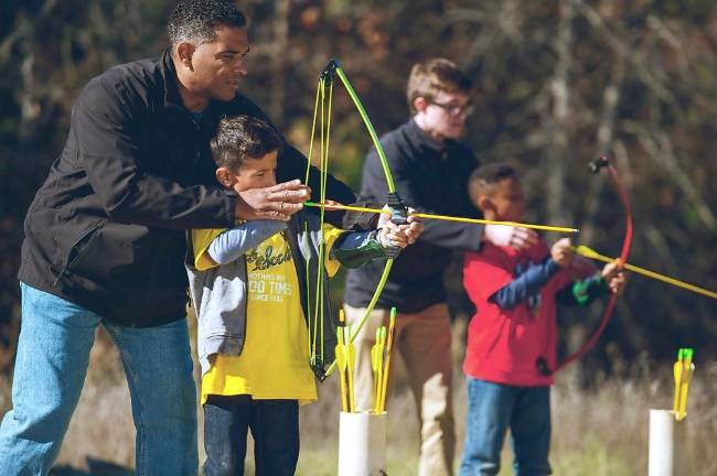 Archery group instruction (Photo by Scott Markewitz)