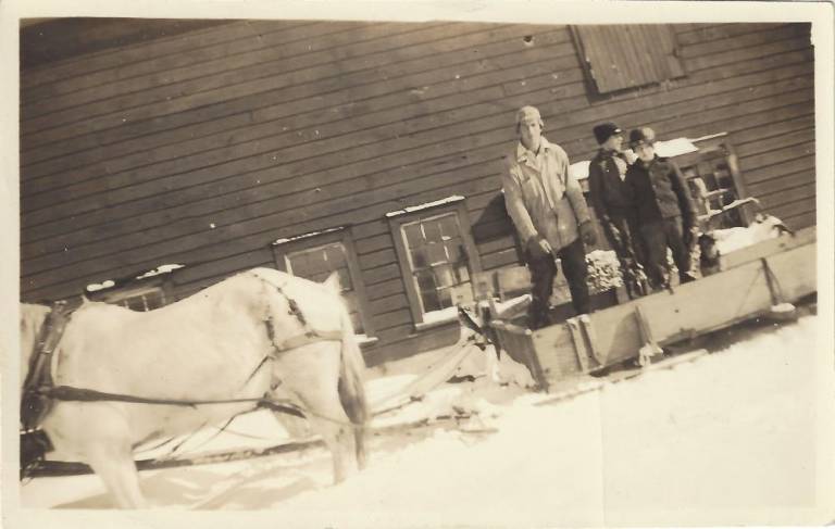 $!In this photo, estimated to be from the late 1930s or early 1940s, a horse pulls a sled in Sparta. (Photo courtesy of Marilyn Van Kirk Mull)