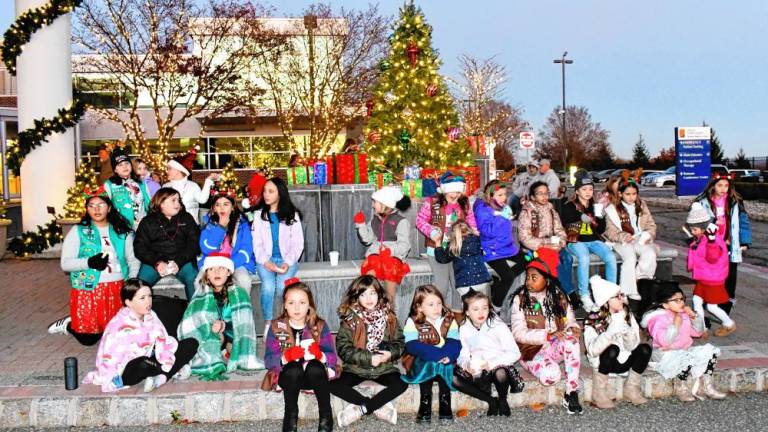 Residents await Santa’s arrival Saturday, Nov. 16 at the C. Edward McCracken Festival of Lights at the Newton Medical Center. (Photos by Maria Kovic)