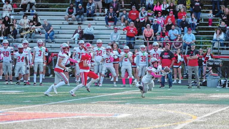 <b>HP1 High Point defensive back Brendan Lehman (21) catches the ball for an interception during the final seconds of the game at Lenape Valley on Friday, Oct. 11. The Wildcats won, 21-14. (Photos by George Leroy Hunter)</b>