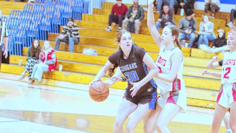 HP1 Kittatinny's Lina Hull handles the ball in the game against High Point on Jan. 4. Kittatinny won, 37-29. (Photos by George Leroy Hunter)