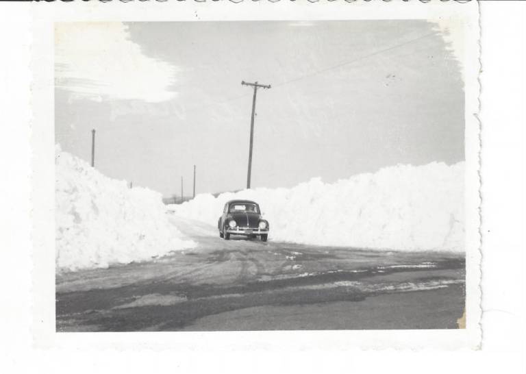 $!A car heads out after a snowstorm in 1955. (Photo courtesy of Chris Van Orden)